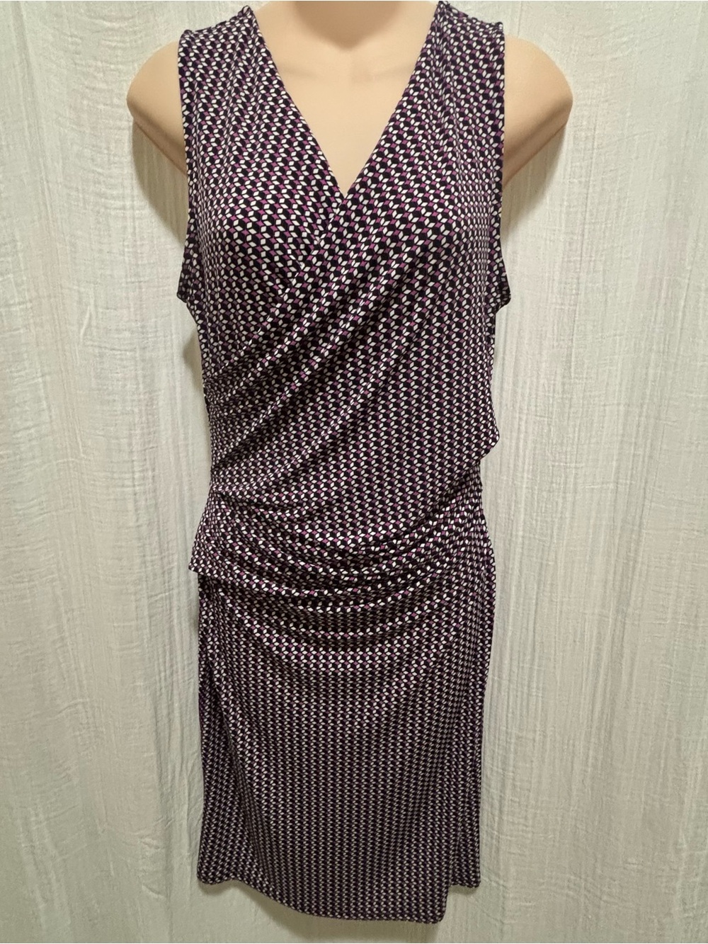 Worthington faux-wrap dress, geometric print purple ruched detailing at the hip.